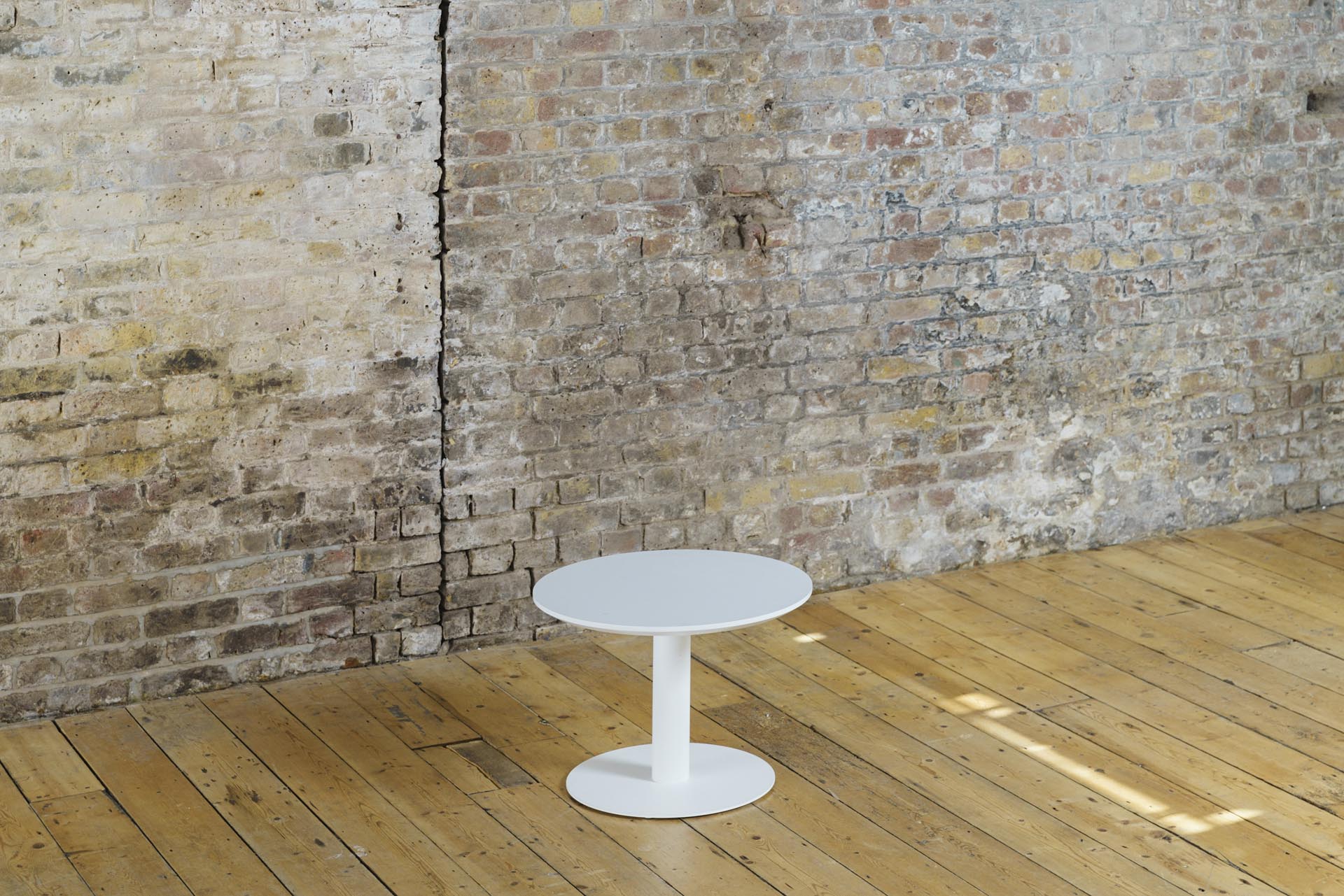 Round Pedestal Coffee Table