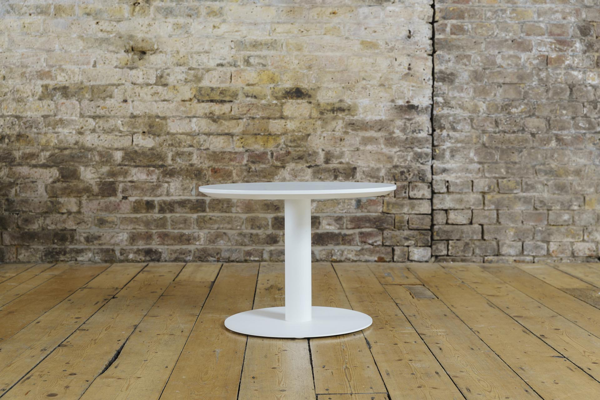 Round Pedestal Coffee Table